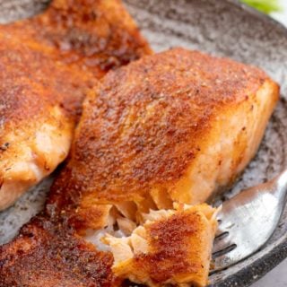 This delicious Air Fryer Salmon is ready in about 10 minutes! Learn how to cook salmon in the air fryer for the perfect healthy, quick dinner.