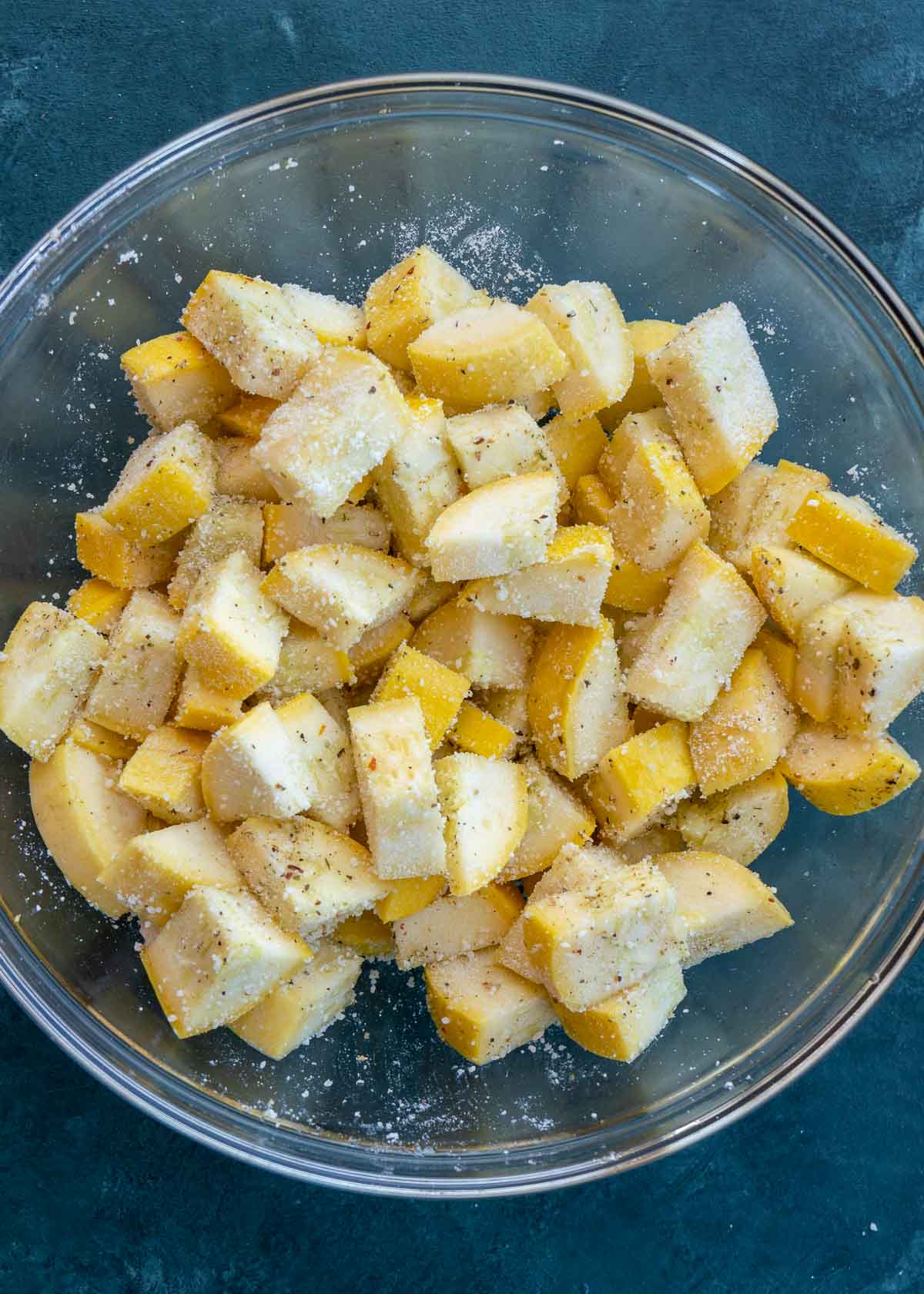 Squash tossed in oil, spices and parmesan