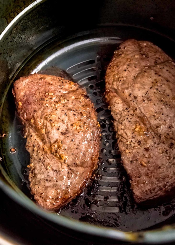 Enjoy a juicy Air Fryer Steak with Compound Butter in just less than 15 minutes tonight! This naturally low-carb, gluten-free meal is quick and easy enough for a busy weeknight.