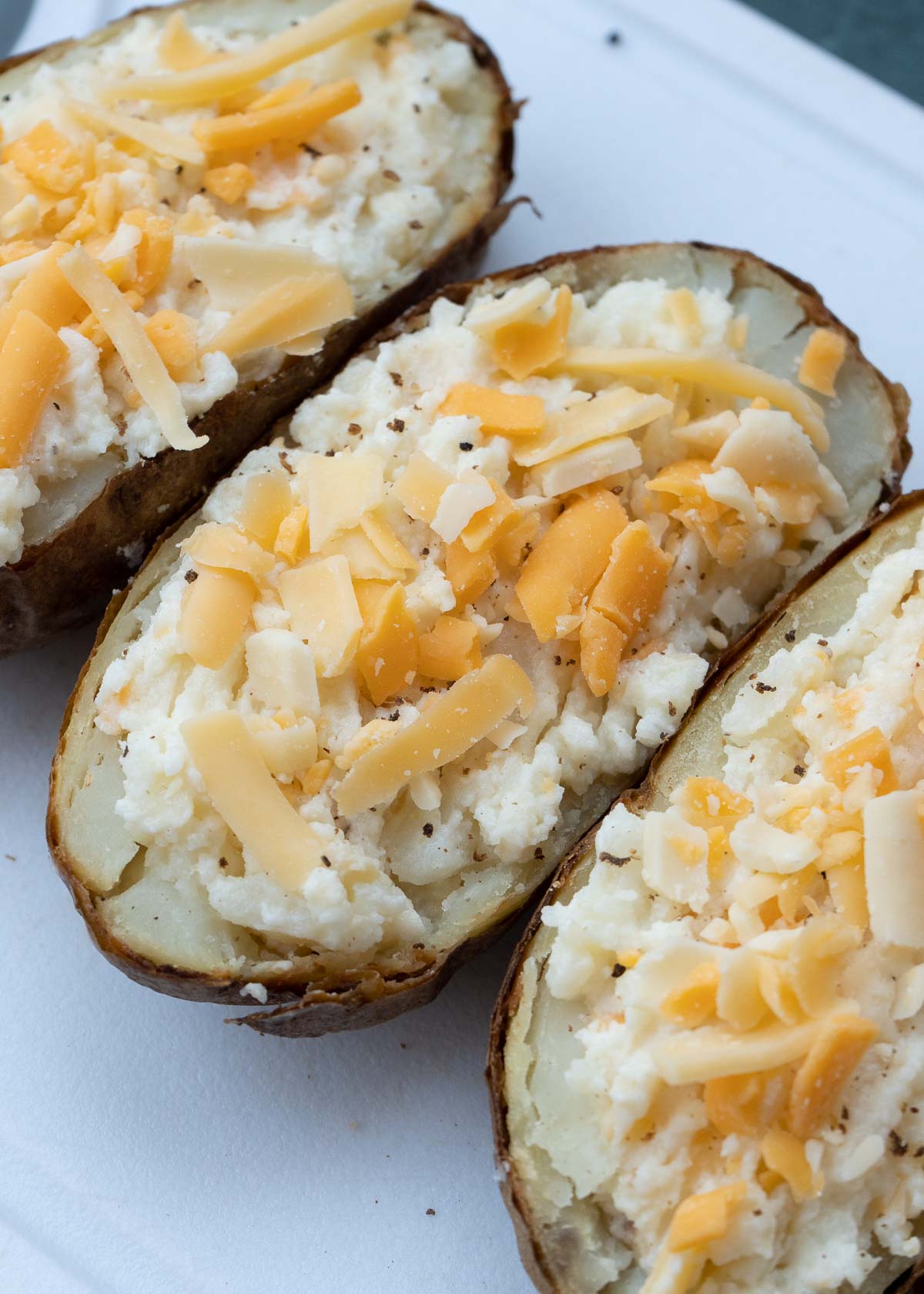 place filled baked potatoes in the air fryer