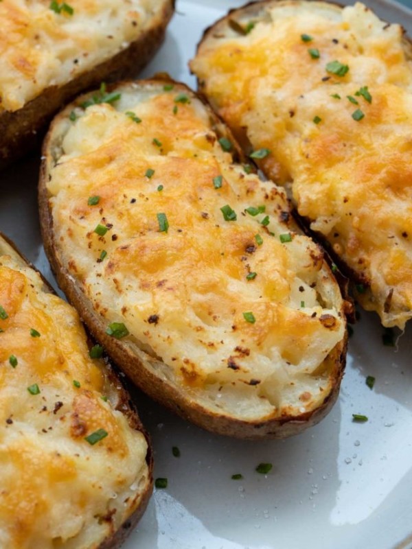 top twice baked potatoes with fresh herbs for a boost of flavor and presentation