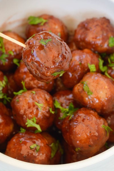 Learn how to cook frozen meatballs in the air fryer for an easy appetizer or meal! The 2-ingredient sauce is simple and delicious.