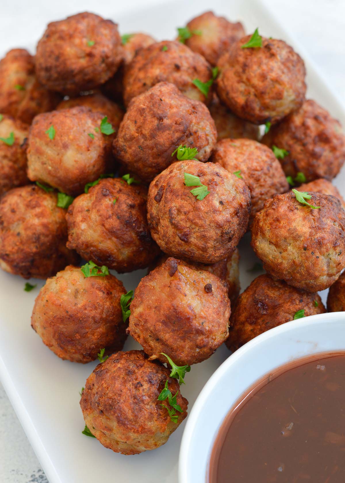 serve un-sauced meatballs with sauce on the side for dipping!