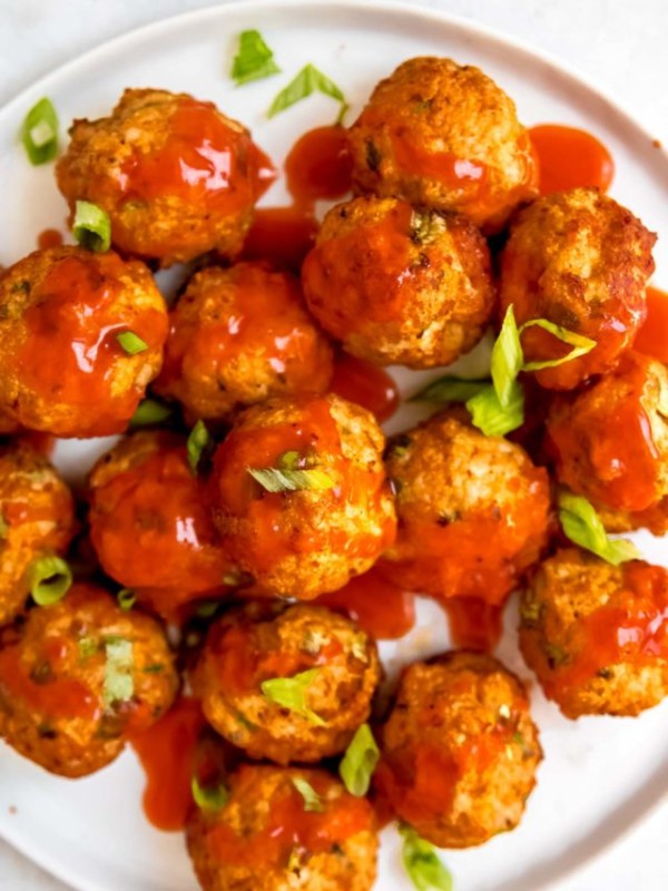 buffalo chicken meatballs on a white plate