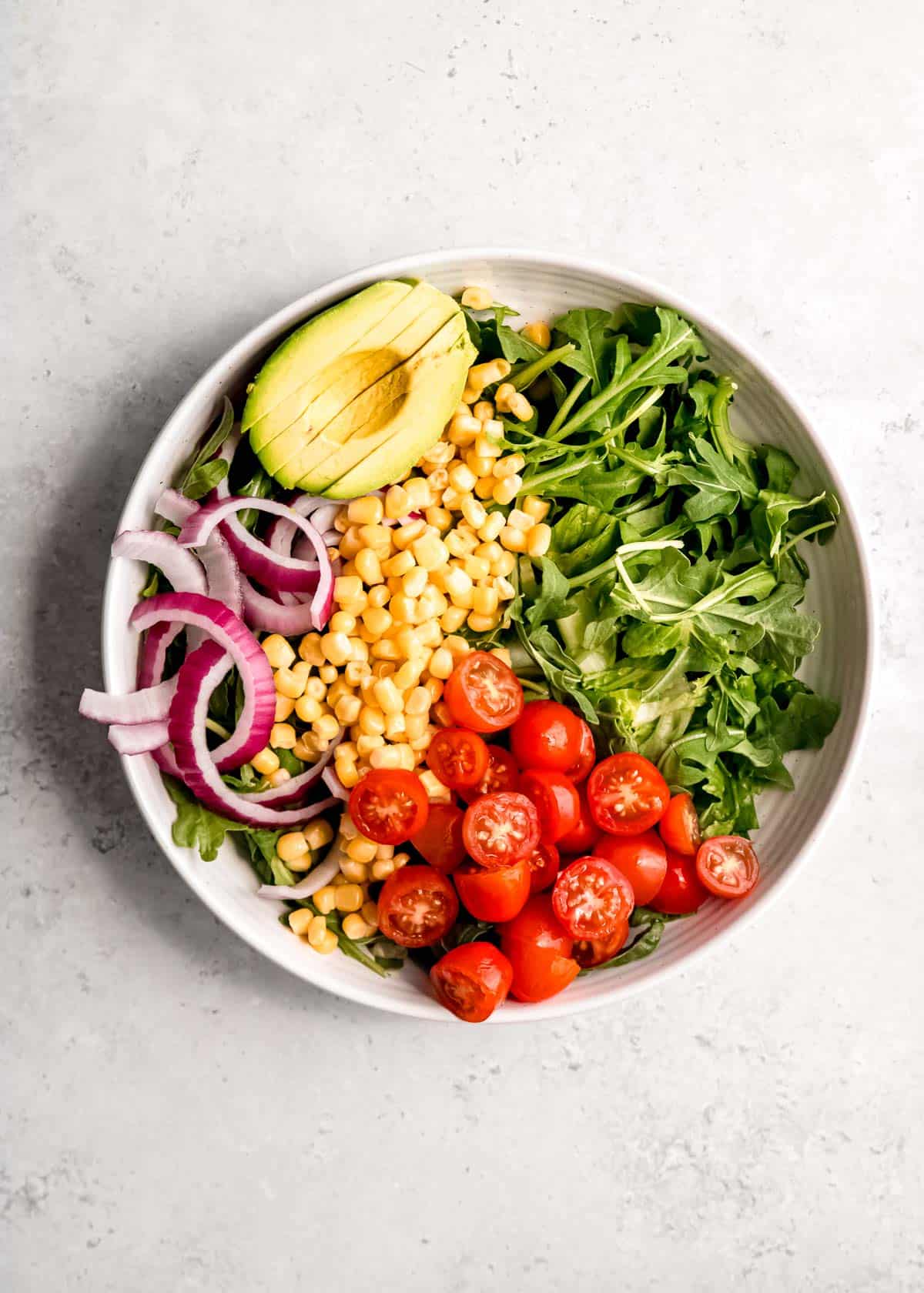 salad ingredients on a white plate