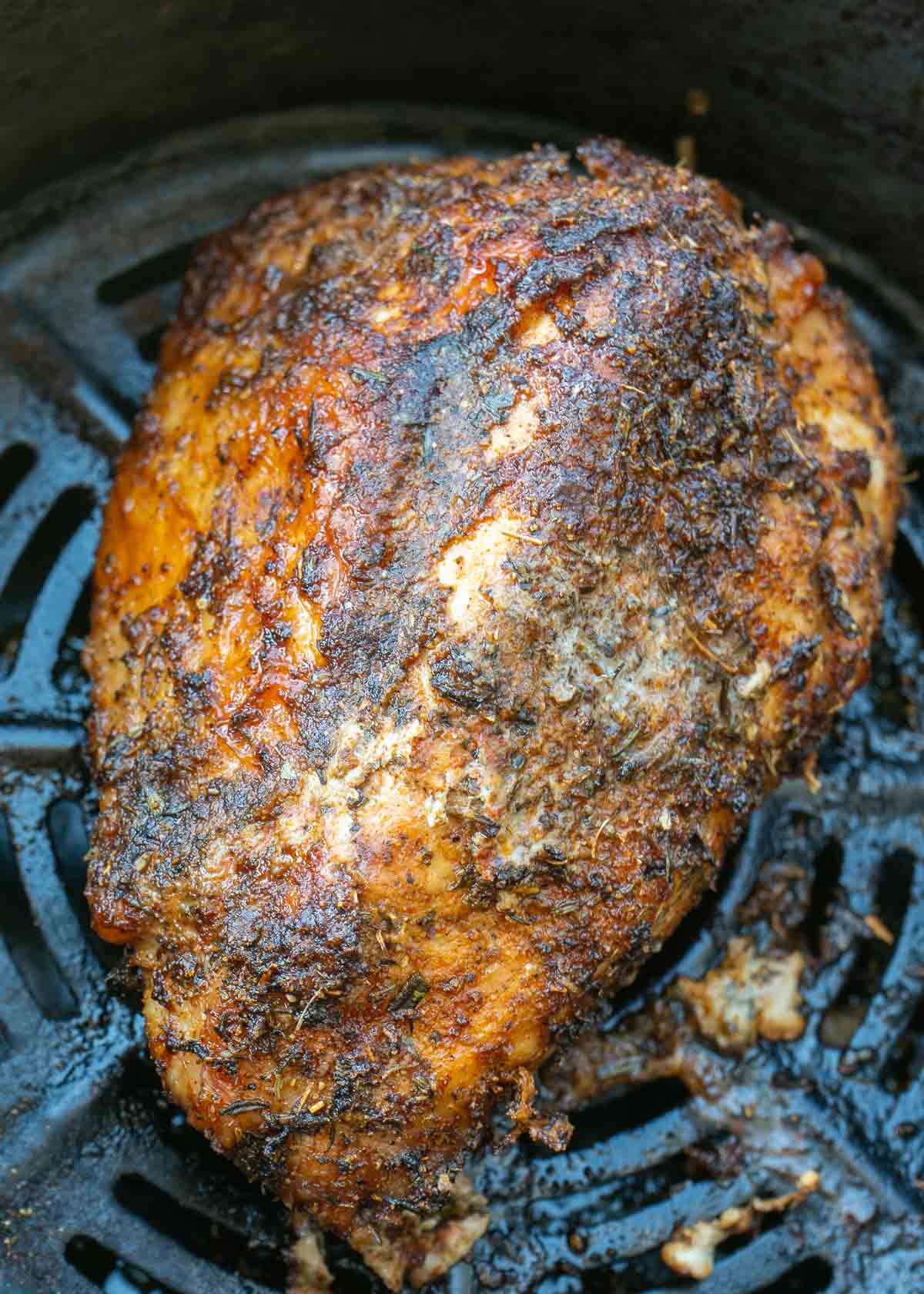 a seasoned, cooked turkey breast in an air fryer