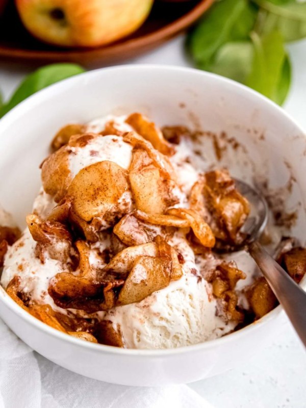 air fryer apples on ice cream in a bowl