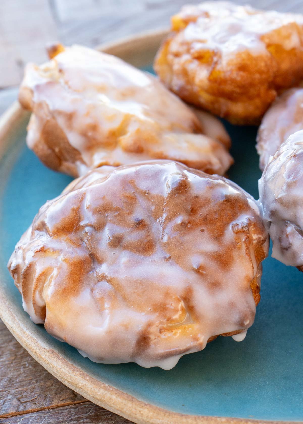 closeup shot of glazed gluten-free apple fritters