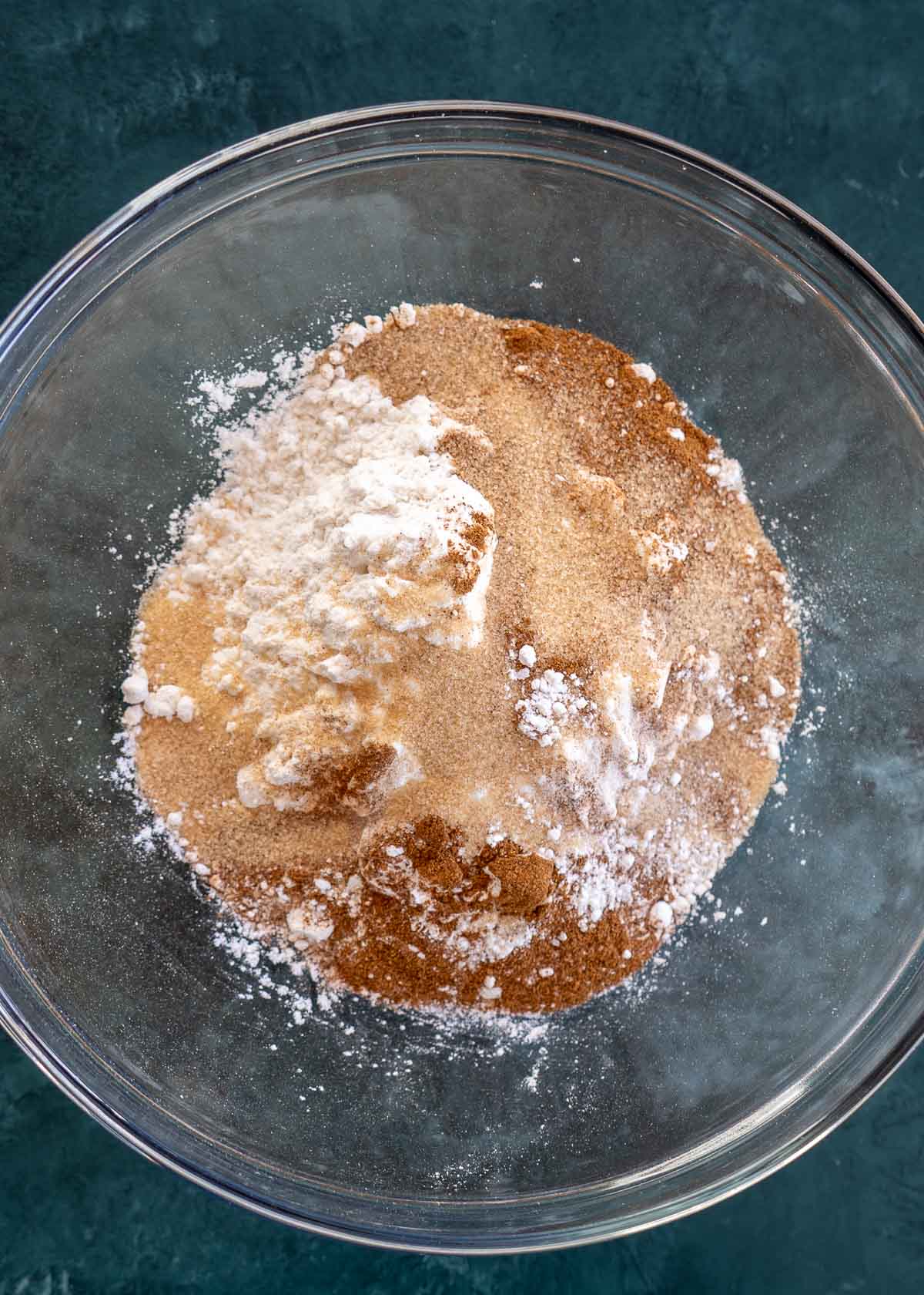 flour, brown sugar, baking powder, salt, and apple pie spice in a glass bowl