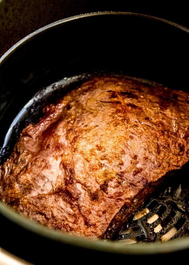a closeup shot of a flank steak in an air fryer