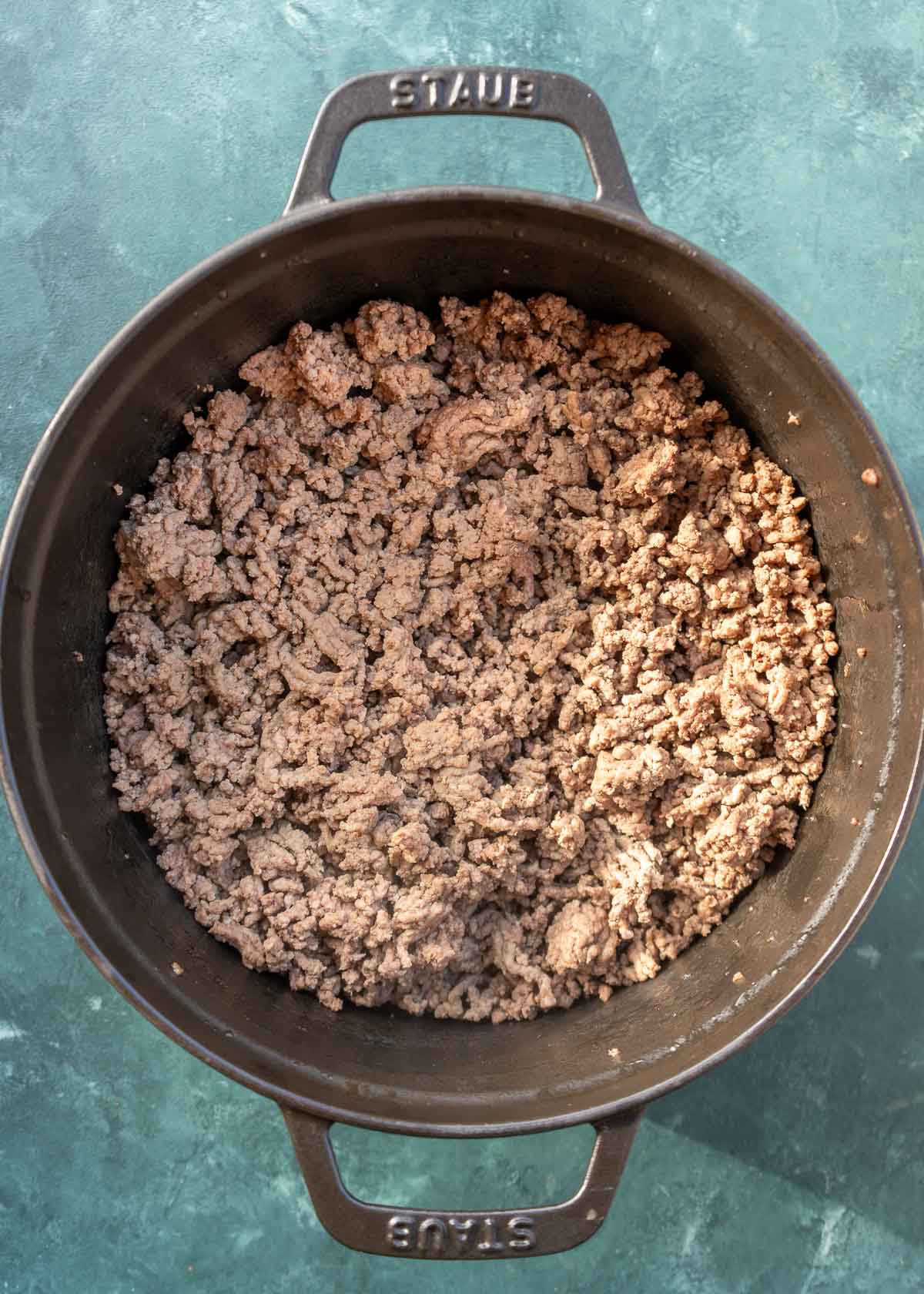 cooked ground meat in cast iron dutch oven