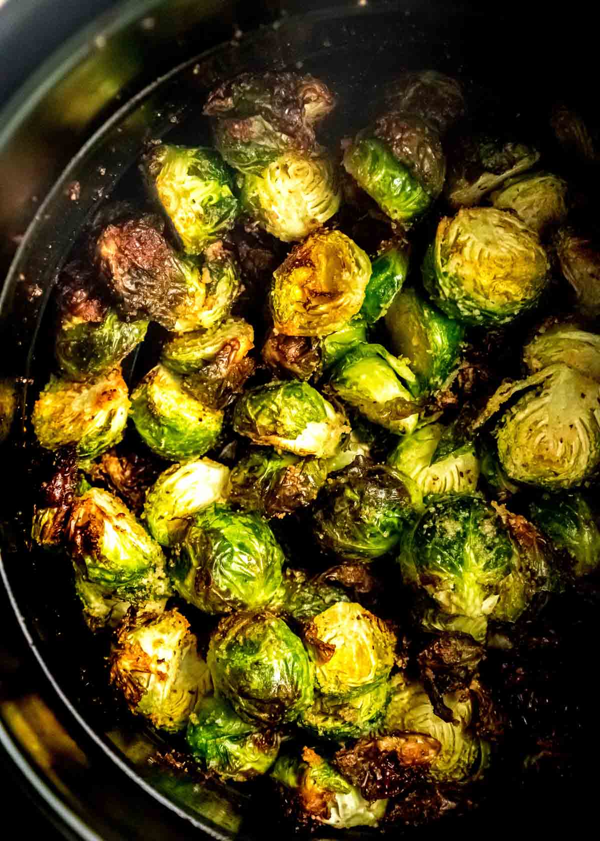 air fryer full of crispy brussels sprouts