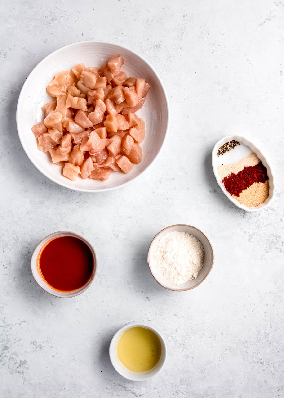 buffalo chicken bite ingredients on a white table
