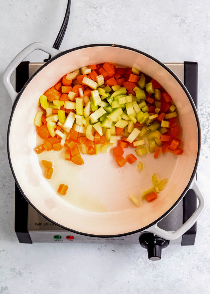 carrots and celery in a dutch oven