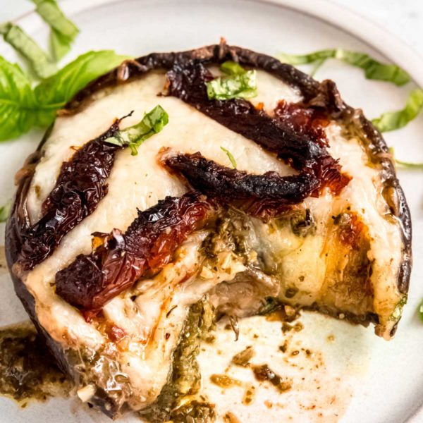 a big portabella mushroom filled with pesto, cheese, and sun dried tomatoes