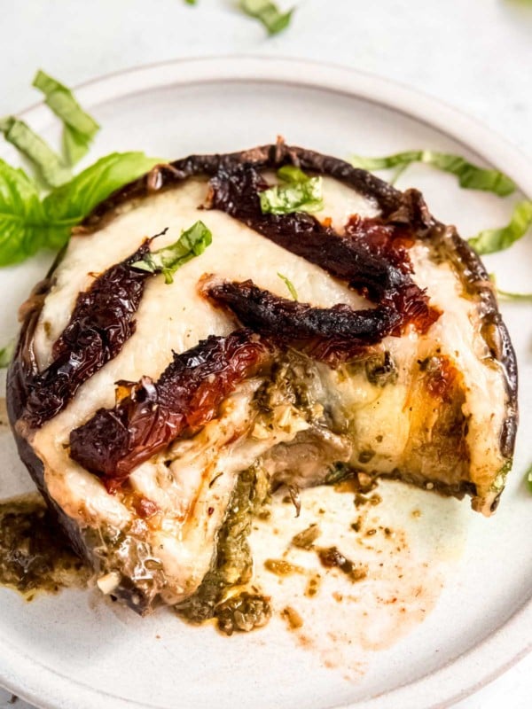 a big portabella mushroom filled with pesto, cheese, and sun dried tomatoes