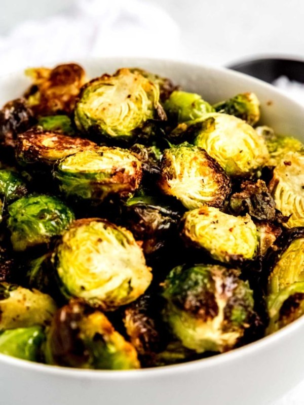 white bowl full of easy air fried brussels sprouts