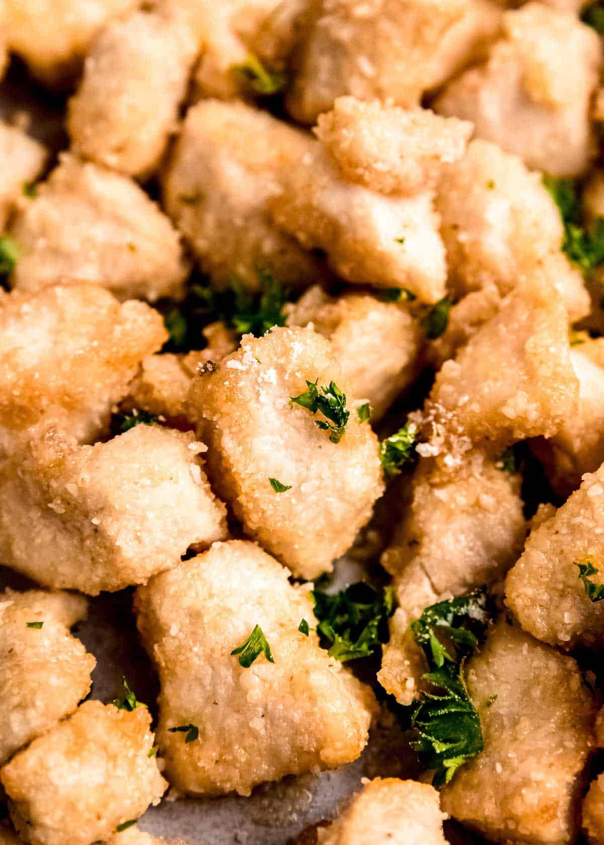 close up image of parmesan chicken bites
