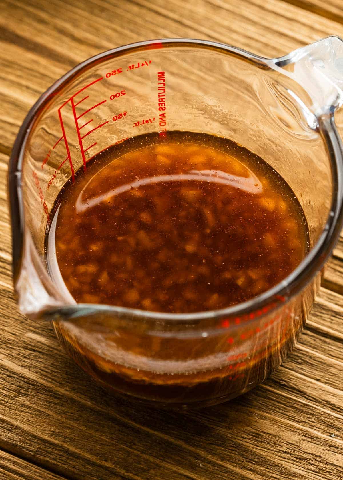 sesame sauce in a measuring cup