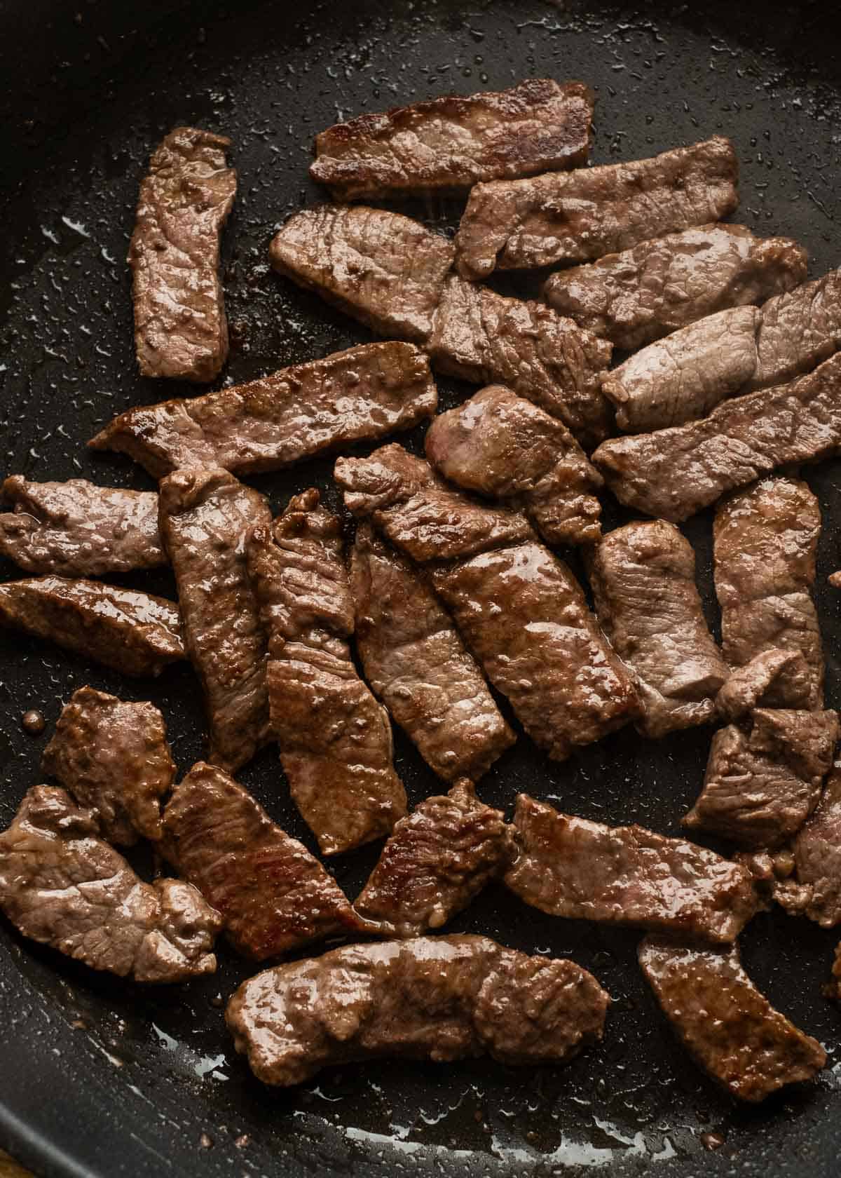 cooked steak in a skillet