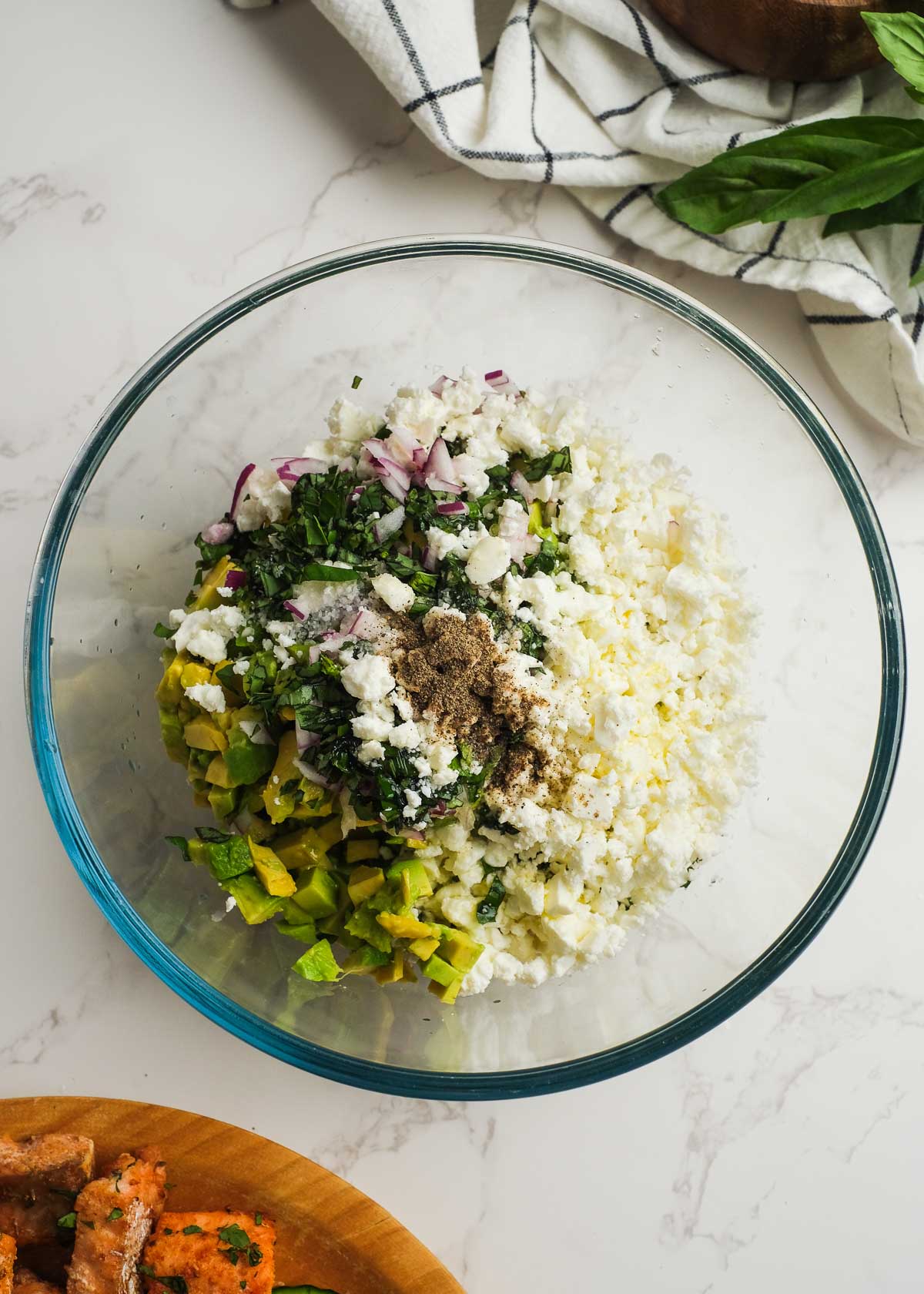 ingredients for avocado feta dip in a bowl