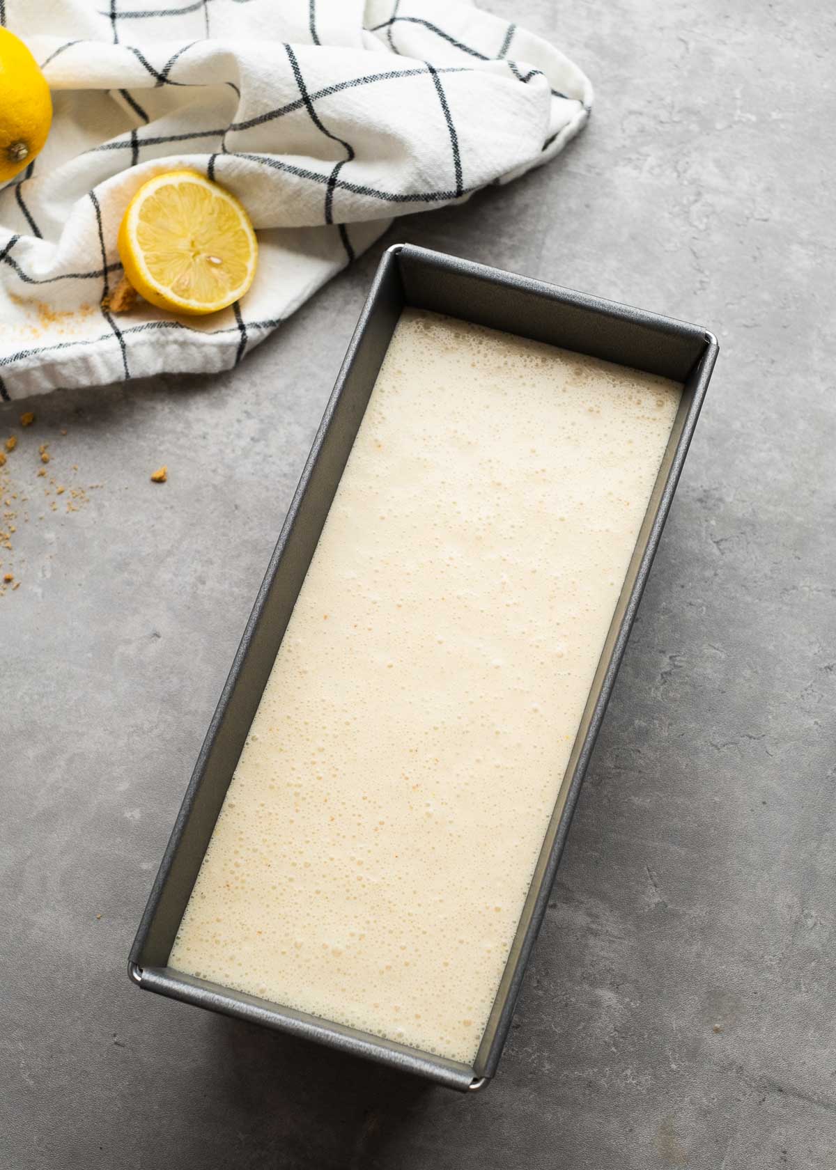 an overhead shot of lemon ice cream batter in a pan