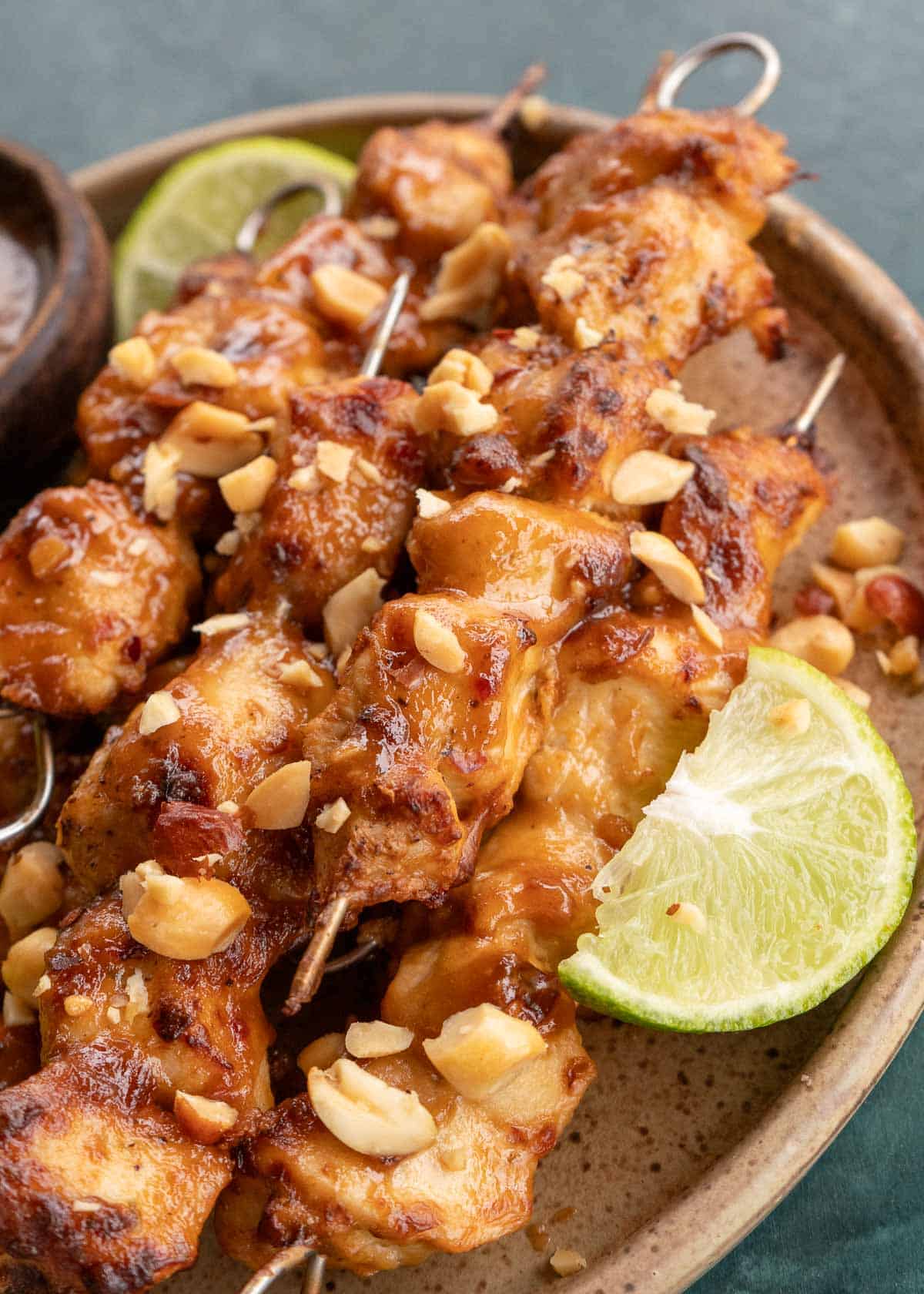 close up, overhead image of thai chicken skewers