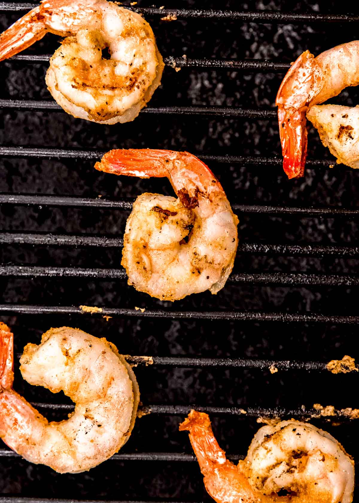 shrimp grilling on a hot grill grate