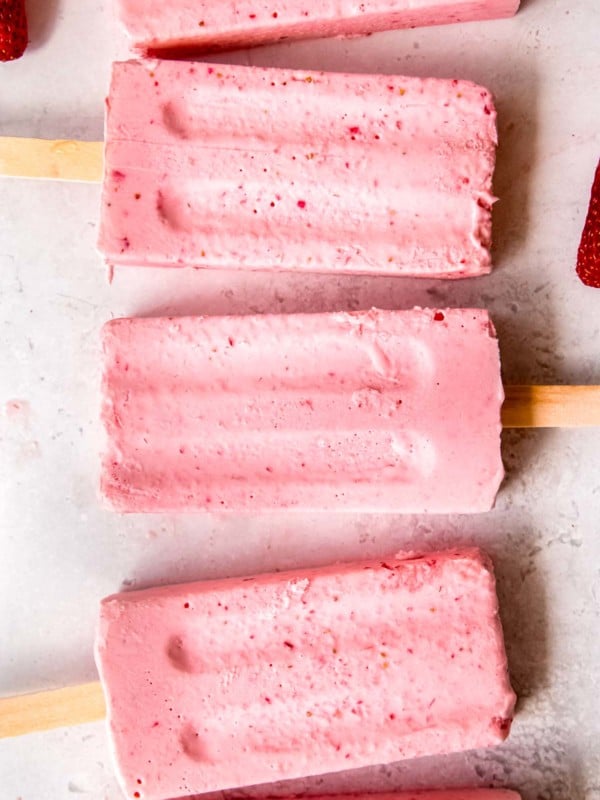 overhead shot of strawberry popsicles