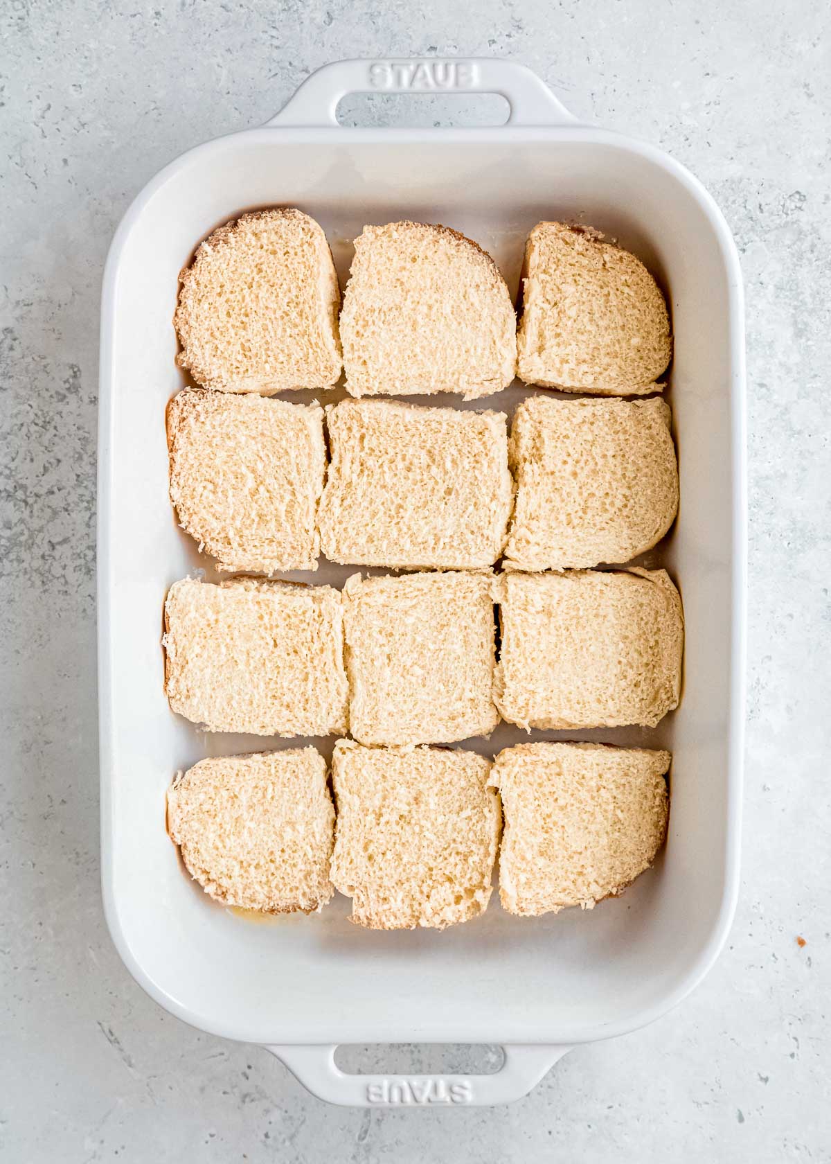 bottoms of rolls in a baking dish