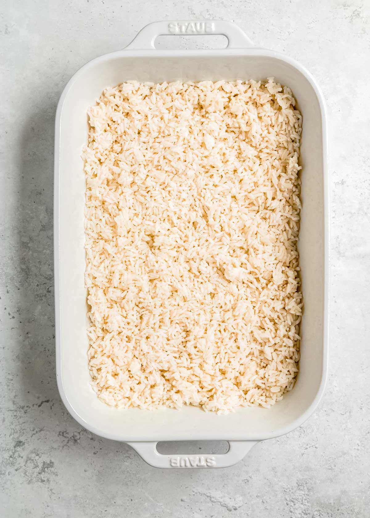 overhead image of rice in baking dish