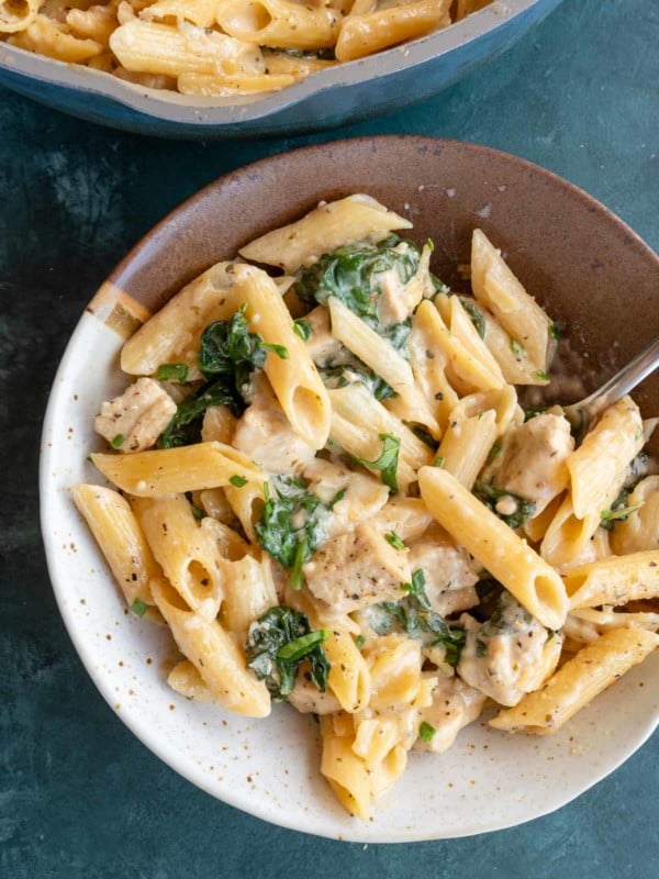 penne spinach pasta in bowl