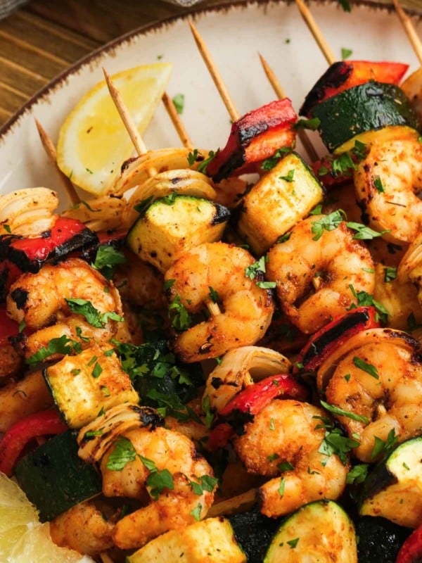 juicy grilled shrimp and vegetables assembled on skewers for easy summer meal