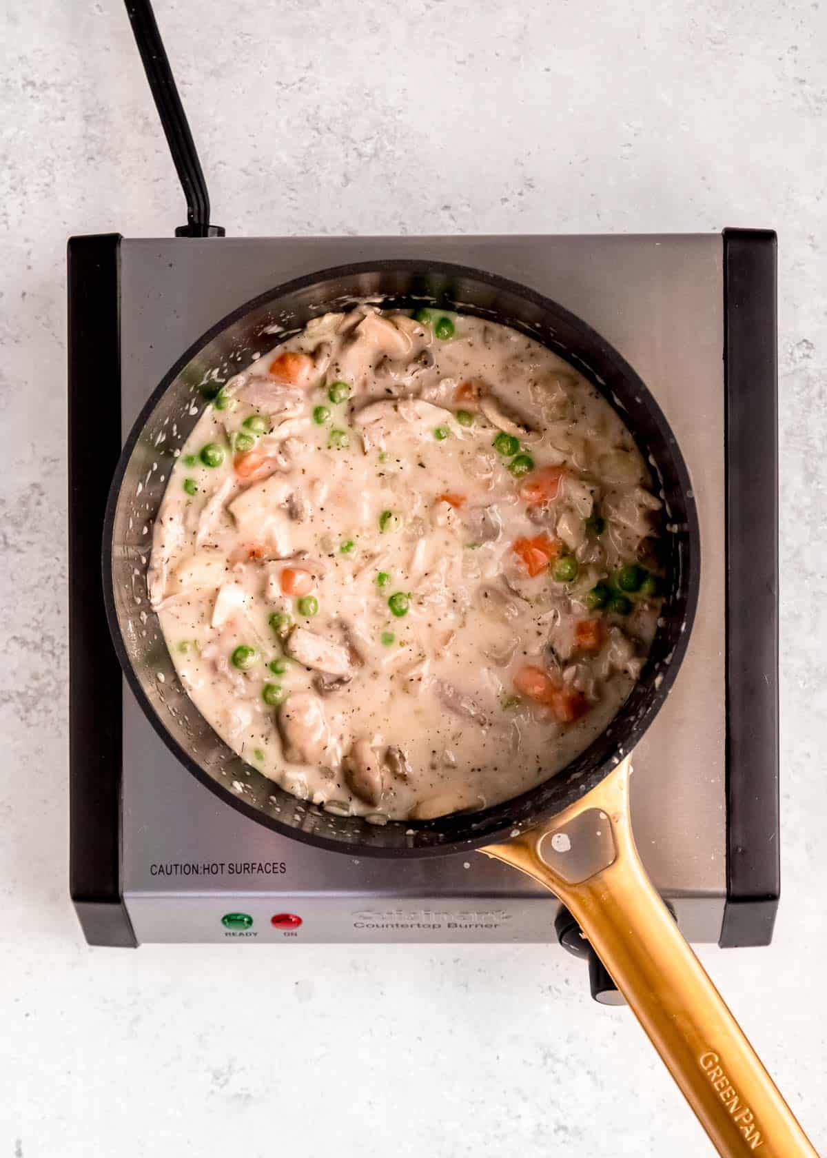 a creamy chicken and veggie filling for mini pot pie recipe