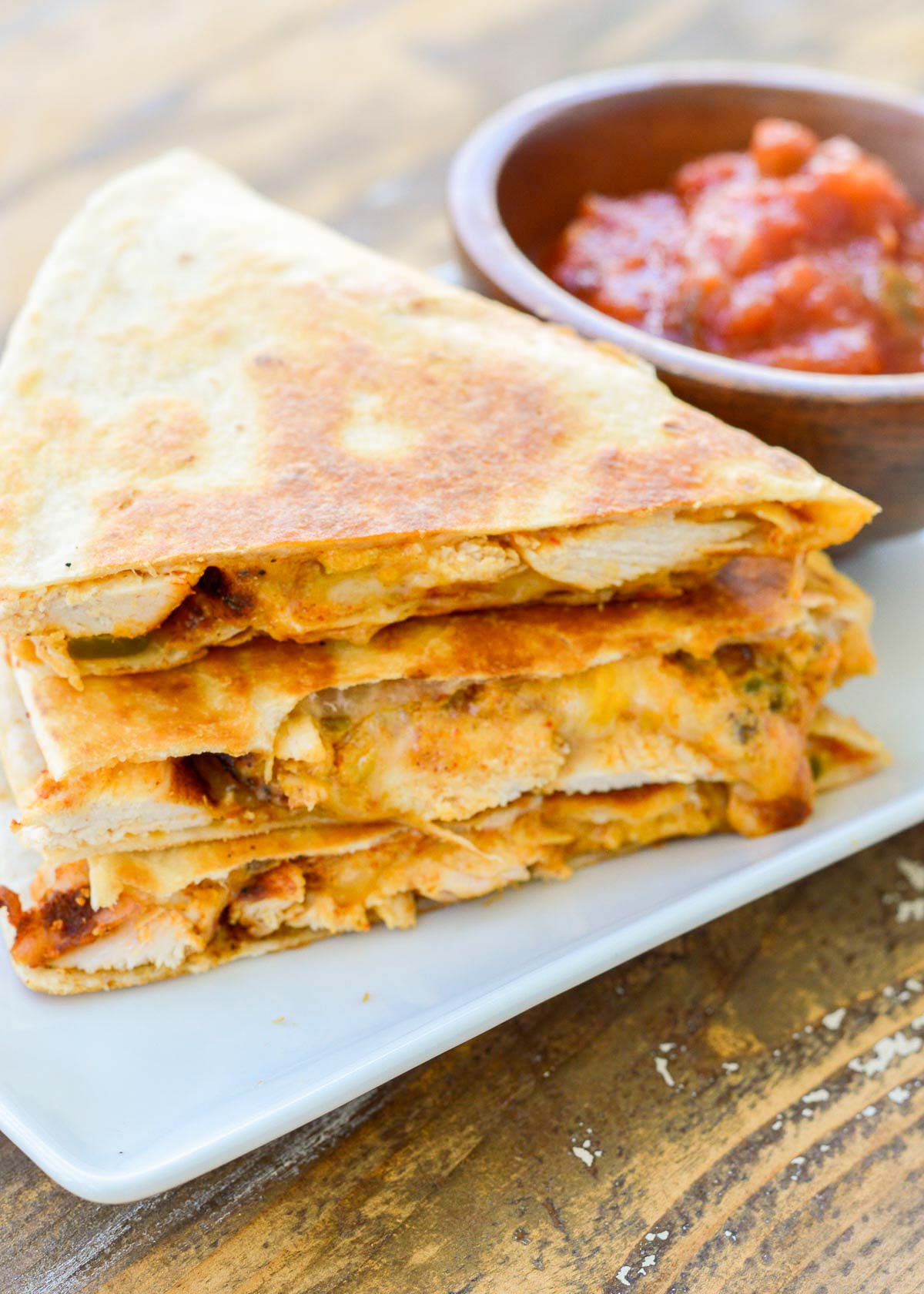 juicy chicken, melty cheese, and creamy sauce in a taco bell chicken quesadilla copycat