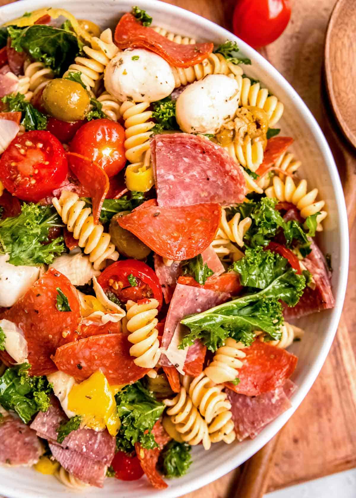overhead shot showing a bowl filled with antipasto pasta salad