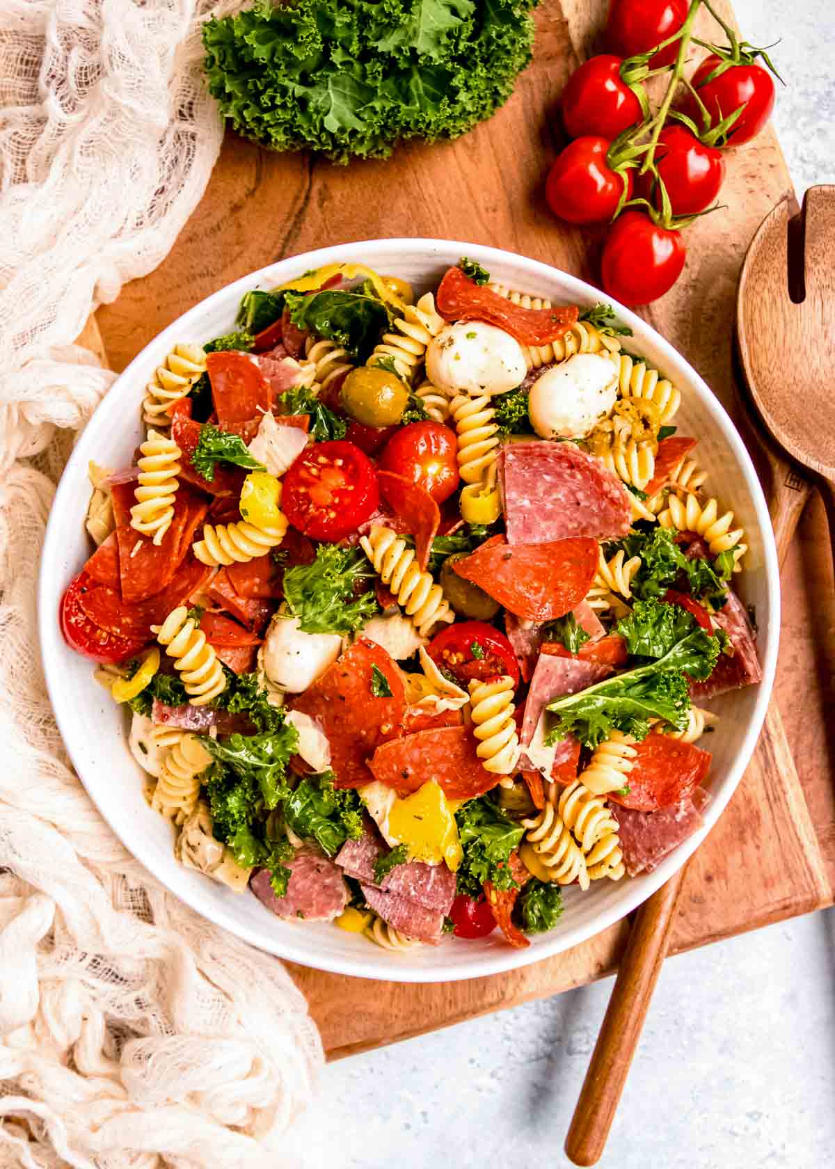 overhead shot showing a flavorful antipasto salad in a bowl