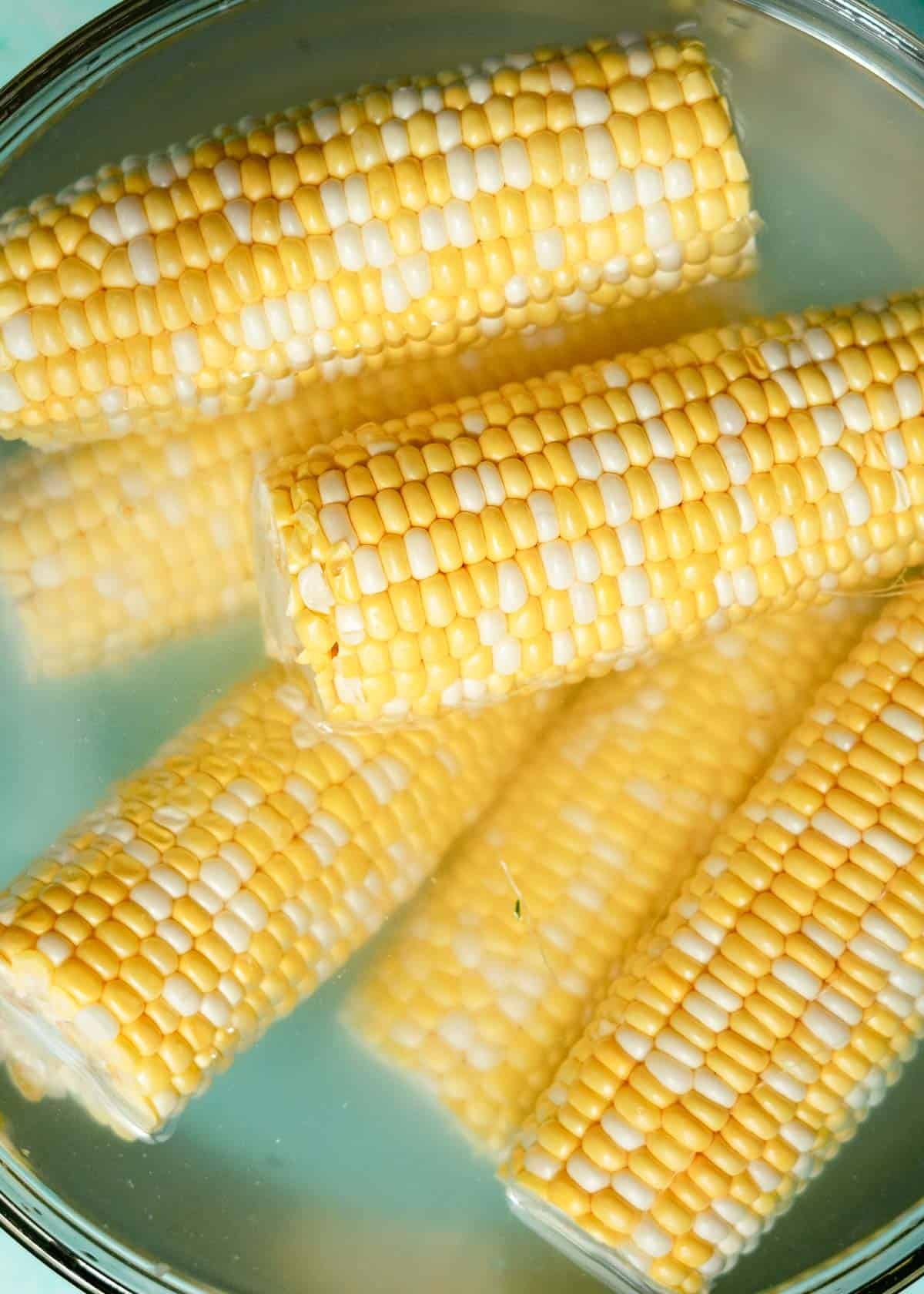 mexican street corn soaking in water