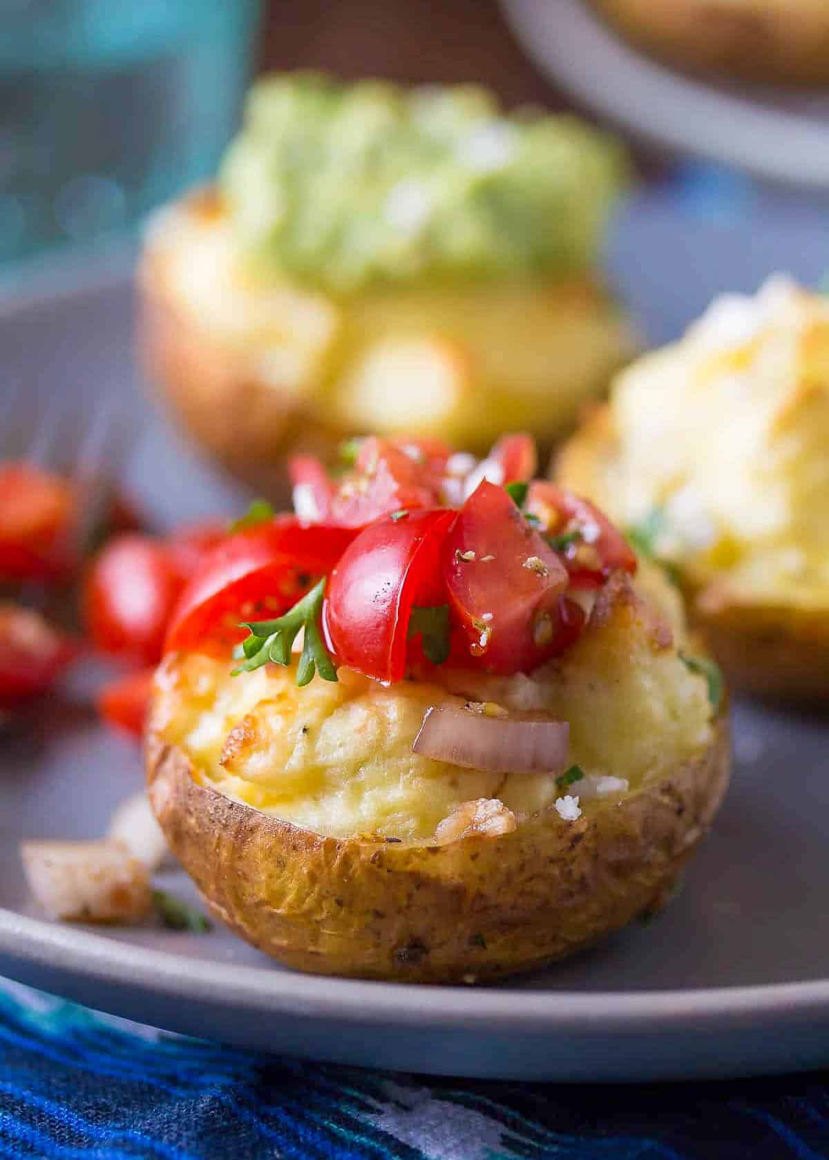 Mediterranean Twice Baked Potatoes topped with Bruschetta