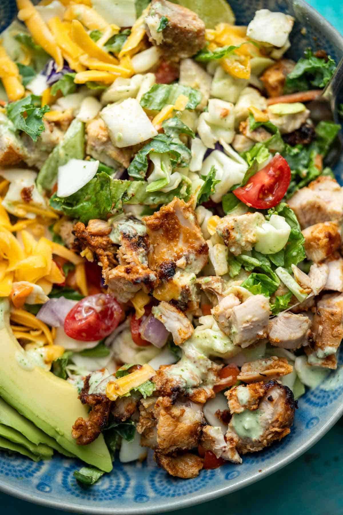 chicken taco salad mixed together with creamy jalapeno ranch