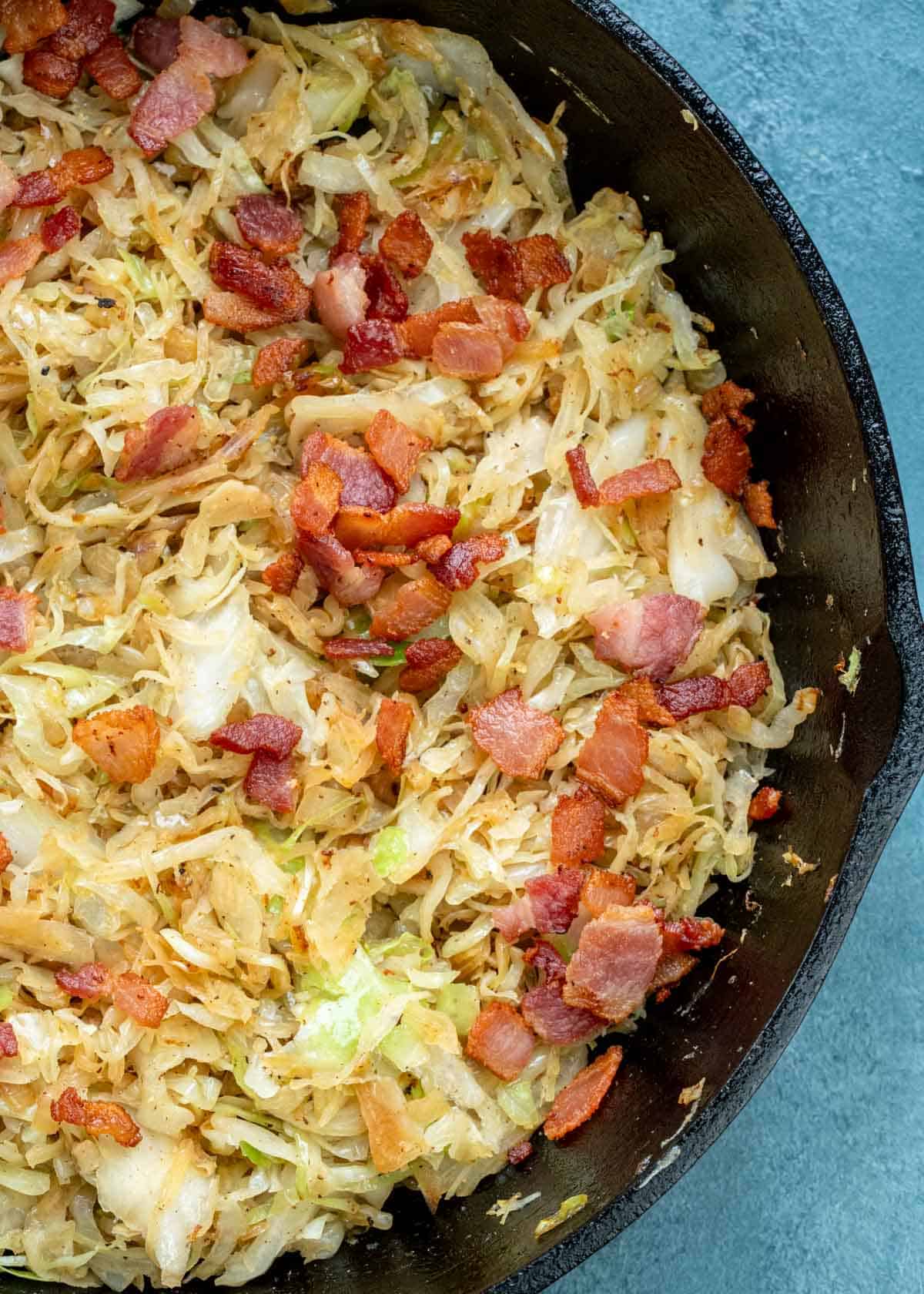 perfectly crispy bacon stirred into fried cabbage