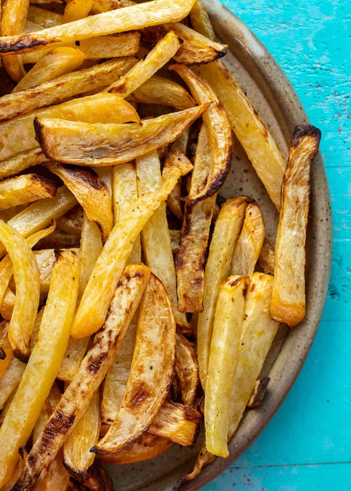baked rutabaga fries on a plate