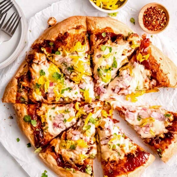 overhead shot of tangy bbq chicken pizza cut into 8 slices