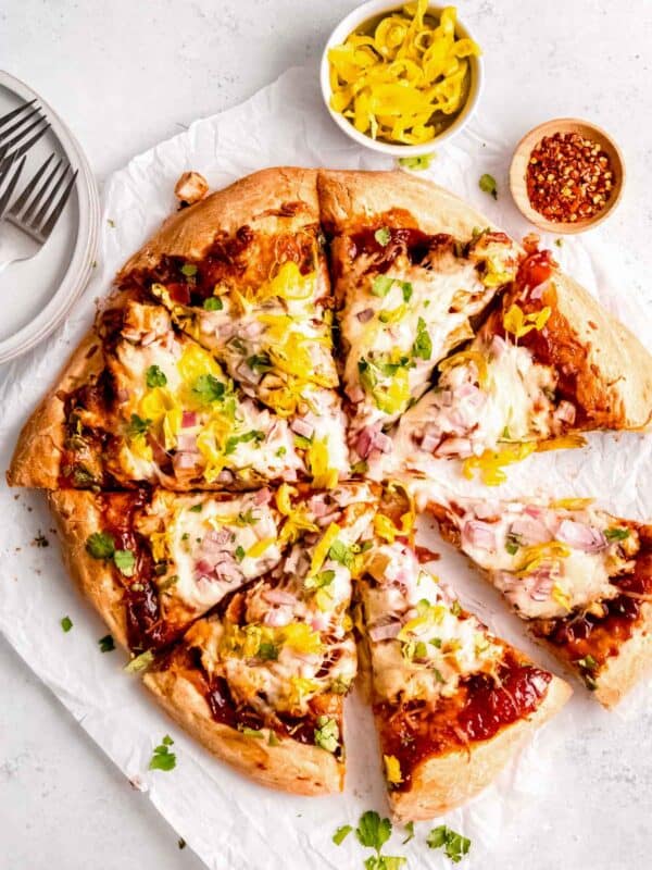 overhead shot of tangy bbq chicken pizza cut into 8 slices