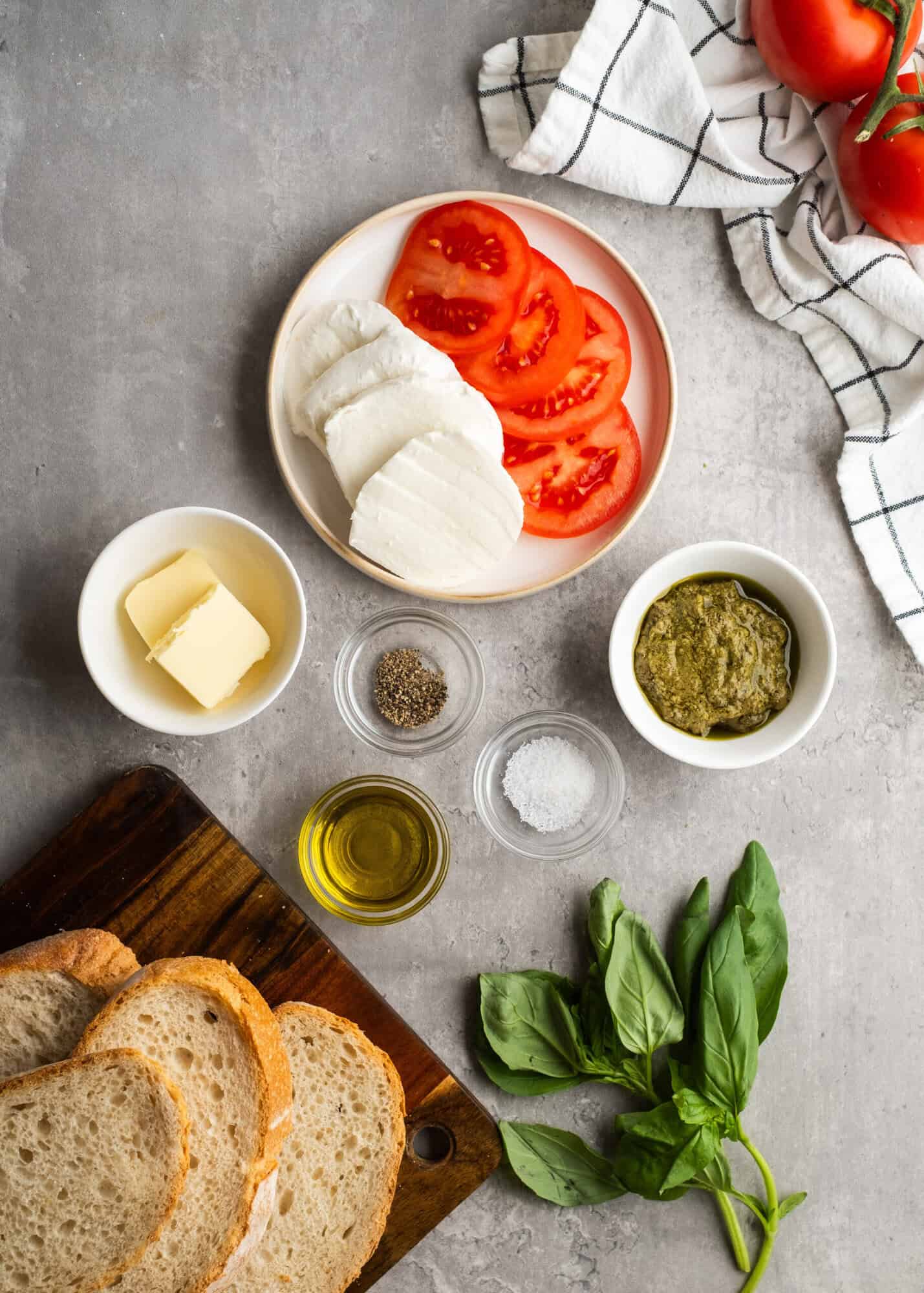pesto sandwich ingredients on a gray table
