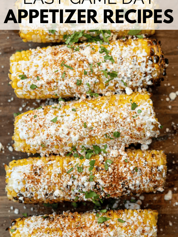 image shows grilled mexican street corn on a cutting board. Text overlay: EASY GAME DAY APPETIZER RECIPES